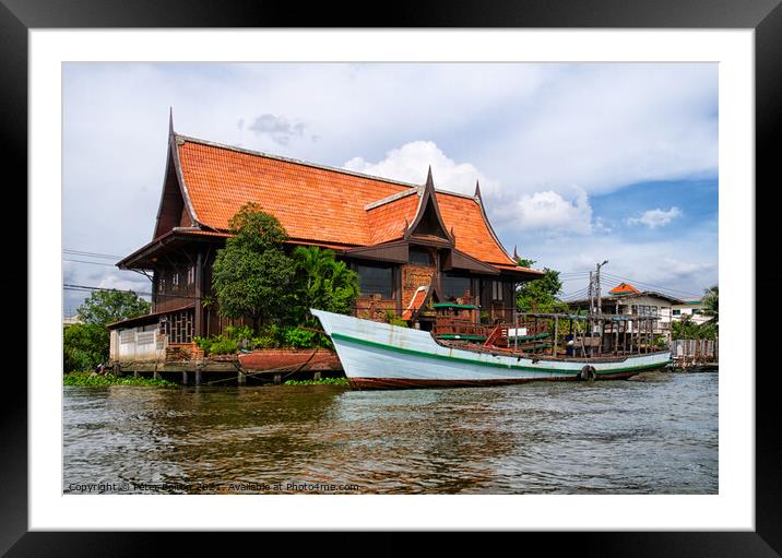A large house on the banks of Chao Phraya, Bangkok, Thailand. Framed Mounted Print by Peter Bolton
