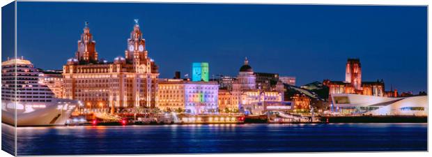 Liverpool's Radiant Nighttime Waterfront Canvas Print by Kevin Elias