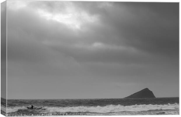 Individual surfer in Wembury Bay with the Great Mew Stone Canvas Print by Peter Barber