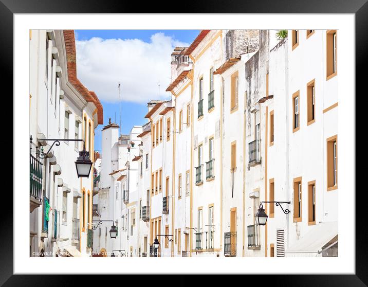 White street in Evora. Portugal Framed Mounted Print by Stefano Orazzini