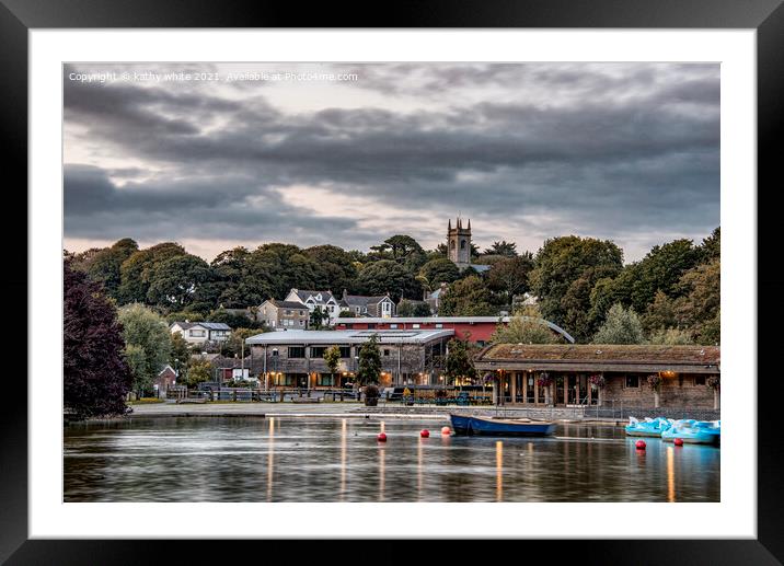 Helston boating lake with the olds catle market Framed Mounted Print by kathy white