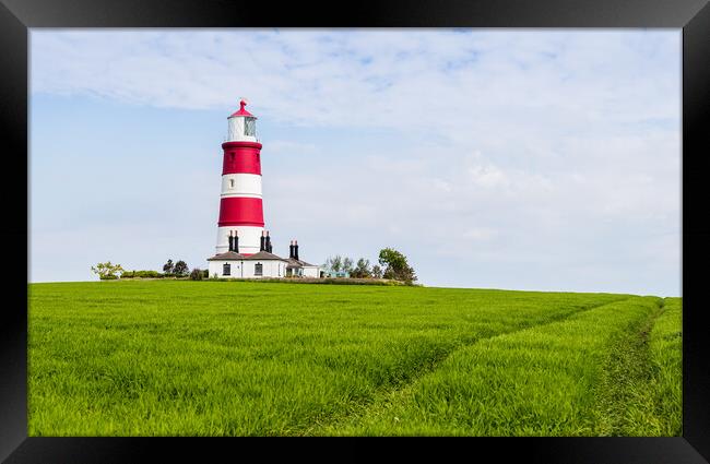 Happisburgh lighthouse on top of a hill Framed Print by Jason Wells
