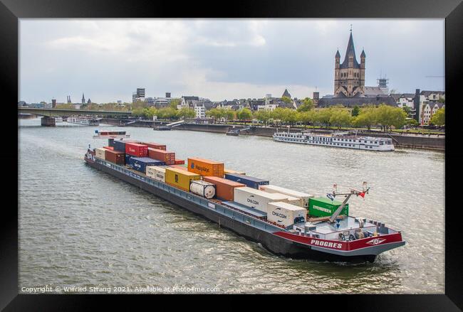 A Container Ship at the Rhine River in Cologne Germany Europe Framed Print by Wilfried Strang