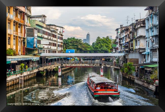 through the canal or klong of Bangkok Thailand Southeast Asia	 Framed Print by Wilfried Strang