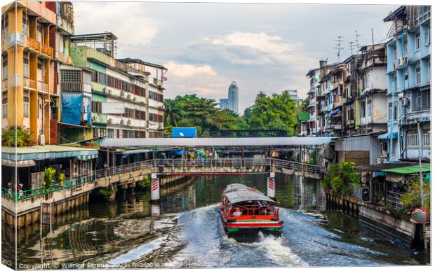 through the canal or klong of Bangkok Thailand Southeast Asia	 Canvas Print by Wilfried Strang