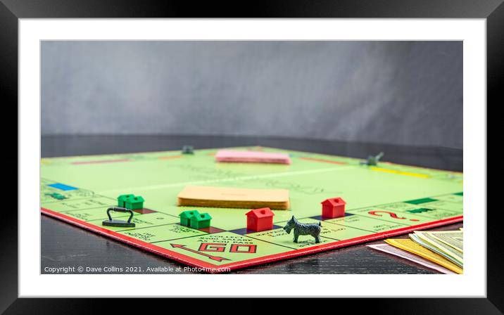 Passing Go on a Monopoly Board Framed Mounted Print by Dave Collins