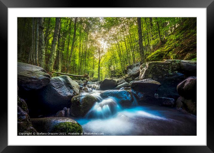 Stream waterfall inside a forest. Apennines, Italy Framed Mounted Print by Stefano Orazzini
