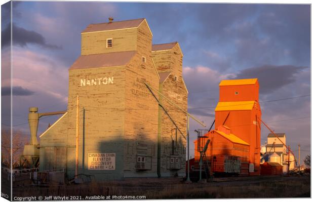 Elevator row in Nanton  Canvas Print by Jeff Whyte