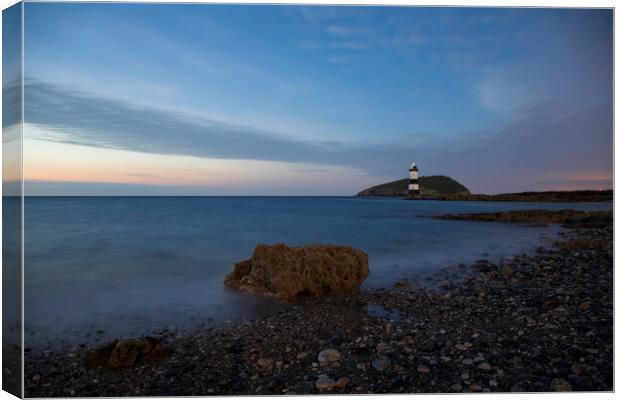 Penmon pebble beach Canvas Print by Rory Trappe