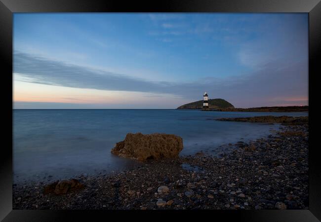 Penmon pebble beach Framed Print by Rory Trappe