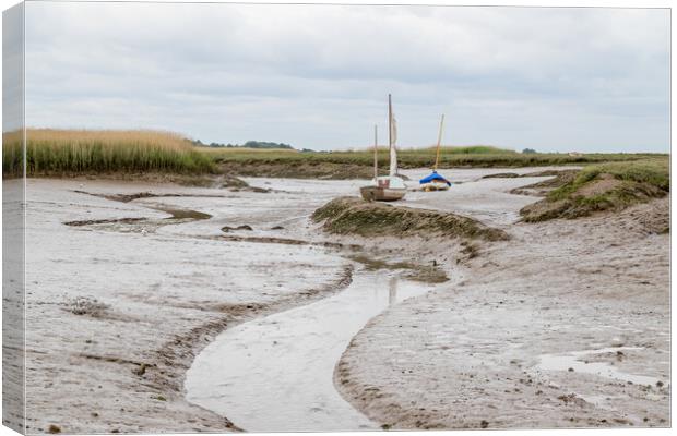 Low tide at Brancaster Staithe Canvas Print by Jason Wells