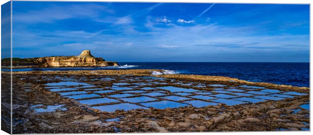 Picturesque Salt pans with reflection of blue clou Canvas Print by Maggie Bajada