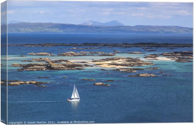 Yacht sailing therough the Skerries off Arisaig Canvas Print by David Morton