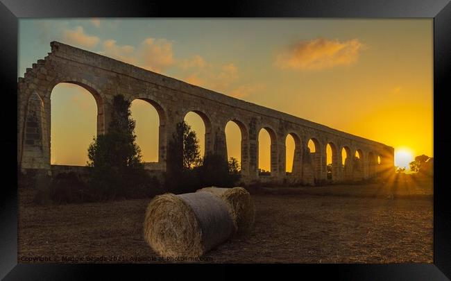 Sunset with Stone Arches and Hay bales, Gozo, Malt Framed Print by Maggie Bajada