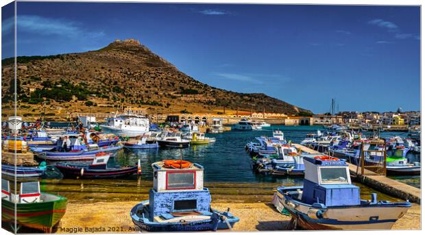 Colorful boats with Mountain background. Canvas Print by Maggie Bajada
