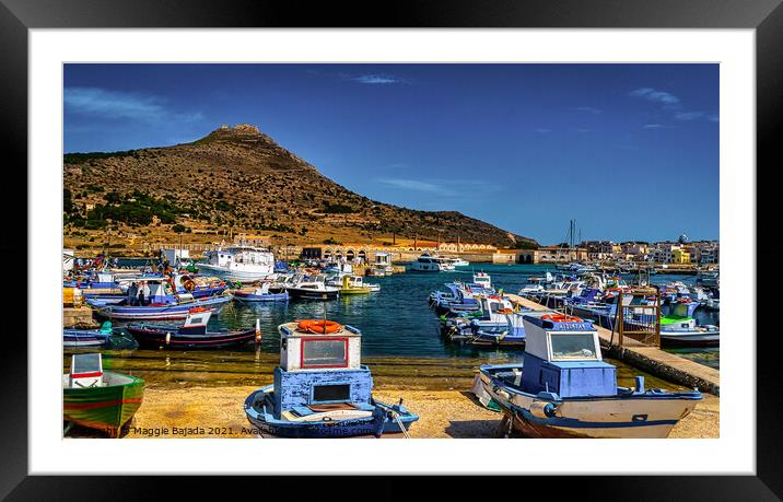 Colorful boats with Mountain background. Framed Mounted Print by Maggie Bajada