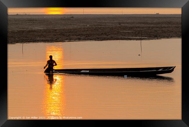 Fisherman in Vientiane Framed Print by Ian Miller