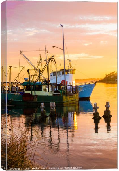 Fishing boats at sunrise. Canvas Print by Kevin Hellon