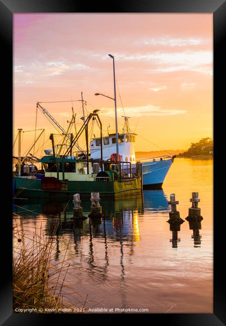 Fishing boats at sunrise. Framed Print by Kevin Hellon
