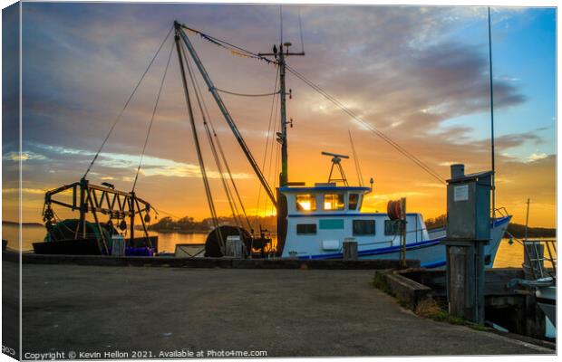 Fishing boats at sunrise. Canvas Print by Kevin Hellon