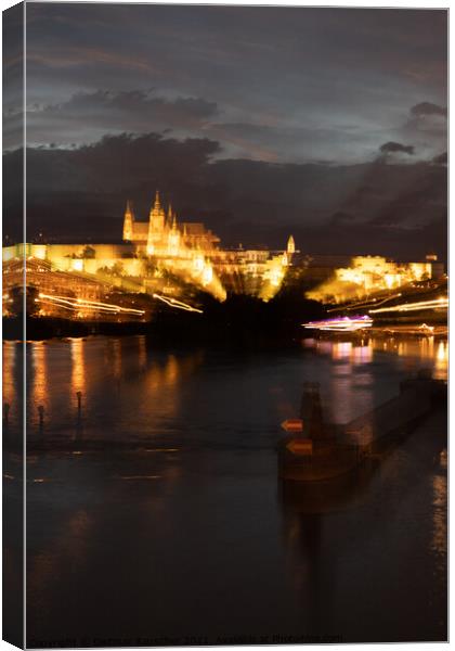 Blurred Cityscape of Prague with River Vltava at Night Canvas Print by Dietmar Rauscher