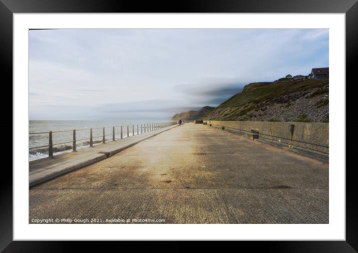 Walking at West Bay Framed Mounted Print by Philip Gough