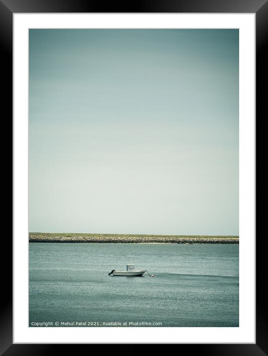 Small white boat moored in water Framed Mounted Print by Mehul Patel