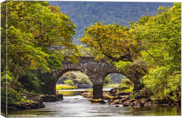 Old Weir Bridge at Meeting of the Waters Killarney Canvas Print by Christian Lademann