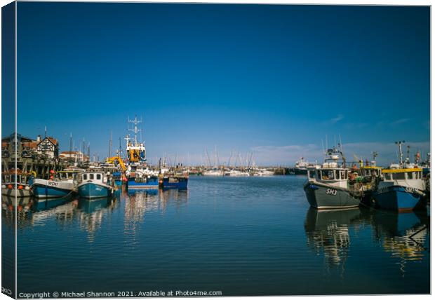Boats moored in Scarborough Harbour Canvas Print by Michael Shannon