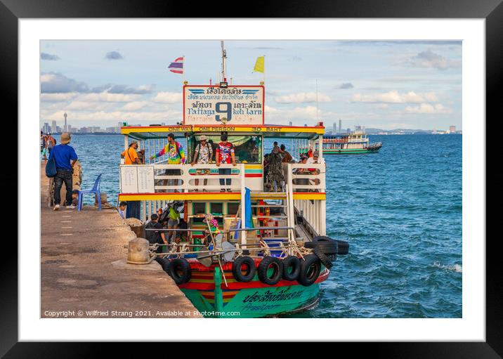 a ferry boat at the Pier of the Thai Island Koh Larn Thailand Asia Framed Mounted Print by Wilfried Strang