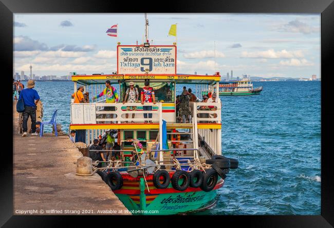 a ferry boat at the Pier of the Thai Island Koh Larn Thailand Asia Framed Print by Wilfried Strang