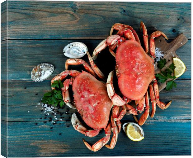 Freshly cooked crab with ingredients in flat lay format for seaf Canvas Print by Thomas Baker
