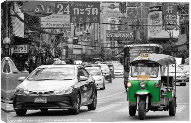 Tuk tuk and taxi in Chinatown, Bangkok Canvas Print by Kevin Hellon