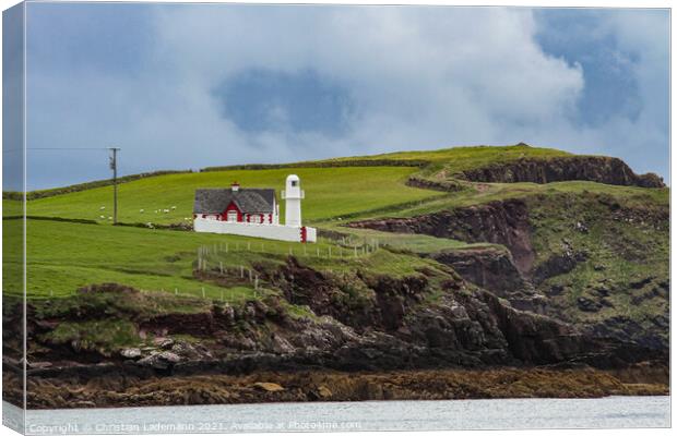 Dingle Lighthouse on cliff coast of Dingle peninsu Canvas Print by Christian Lademann