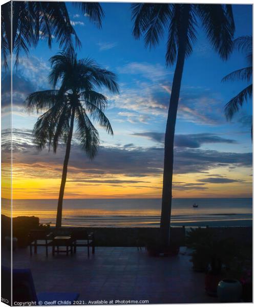 Exotic tropical sunrise seascape with Palm Trees in silhouette.  Canvas Print by Geoff Childs