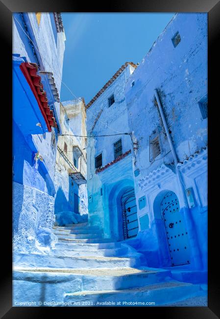 Street in the blue city of Chefchaouen in Morocco Framed Print by Delphimages Art