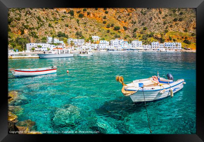 Crete, Greece. Fishing boat in the scenic village  Framed Print by Delphimages Art