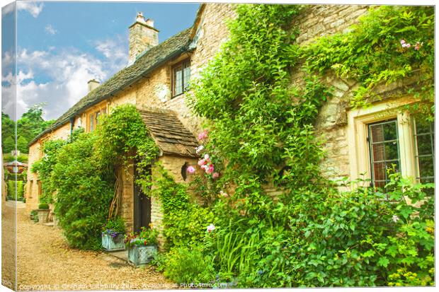 Castle Combe Cottage Canvas Print by Graham Lathbury