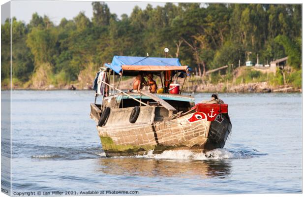 Working Riverboat, Vietnam Canvas Print by Ian Miller