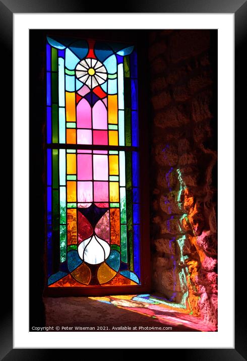 Radiant colours in a stained glass window Framed Mounted Print by Peter Wiseman