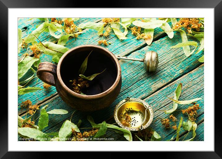 Healing tea from linden,cup of linden tea Framed Mounted Print by Mykola Lunov Mykola
