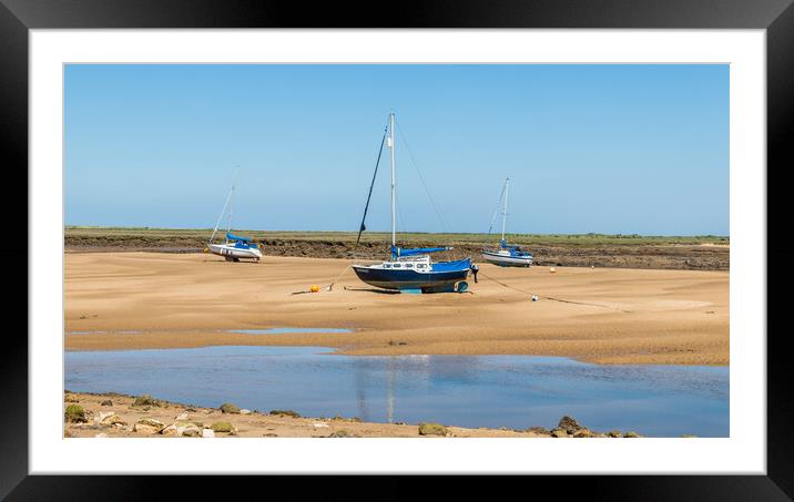 Trio of boats beached at Wells next the Sea Framed Mounted Print by Jason Wells