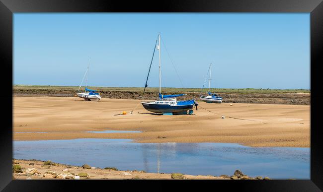 Trio of boats beached at Wells next the Sea Framed Print by Jason Wells