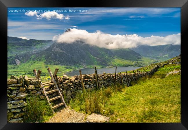 Tryfan Mountain And Llyn Ogwen Snowdonia  Framed Print by Adrian Evans