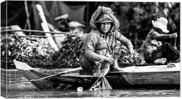 Woman Fishing in Vietnam Canvas Print by Ian Miller