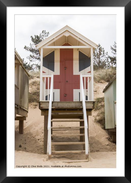 Union jack beach hut Framed Mounted Print by Clive Wells