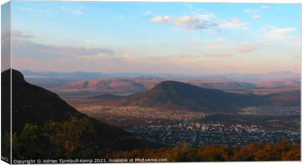 Graaff-Reinet from valley road at dusk Canvas Print by Adrian Turnbull-Kemp