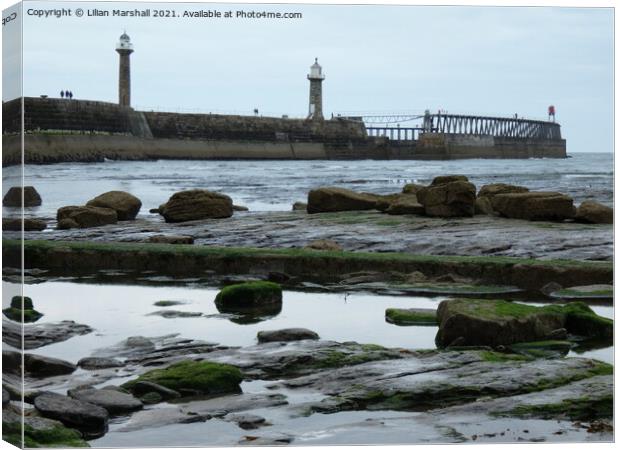 Whitby Lighthouse Canvas Print by Lilian Marshall