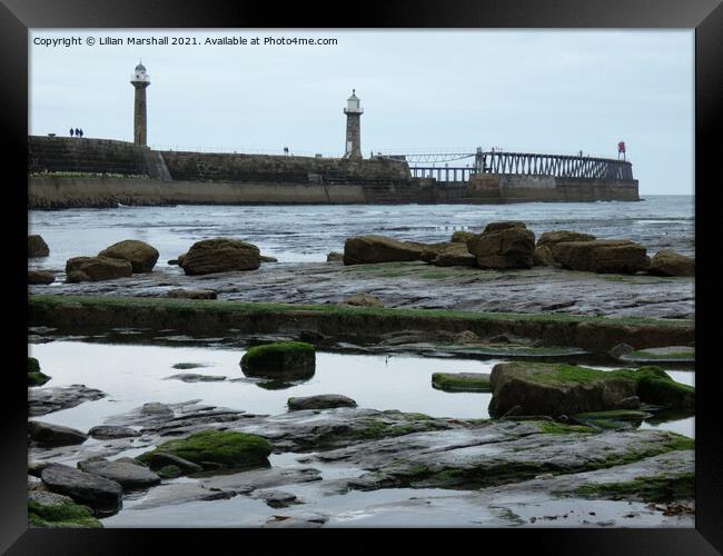 Whitby Lighthouse Framed Print by Lilian Marshall
