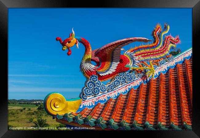 Dragon Sculpture on a roof at a Chinese Temple in Thailand Asia Framed Print by Wilfried Strang
